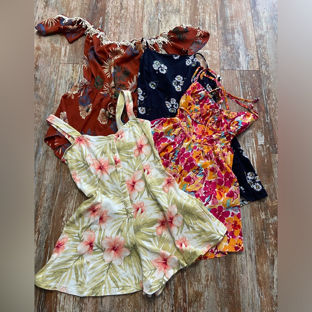 Bundle of 4 Rompers size small.